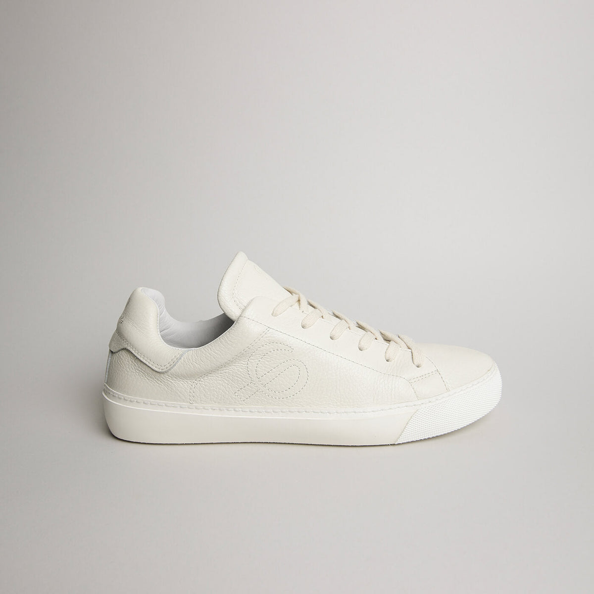 White tumbled leather Milano sneaker in side profile