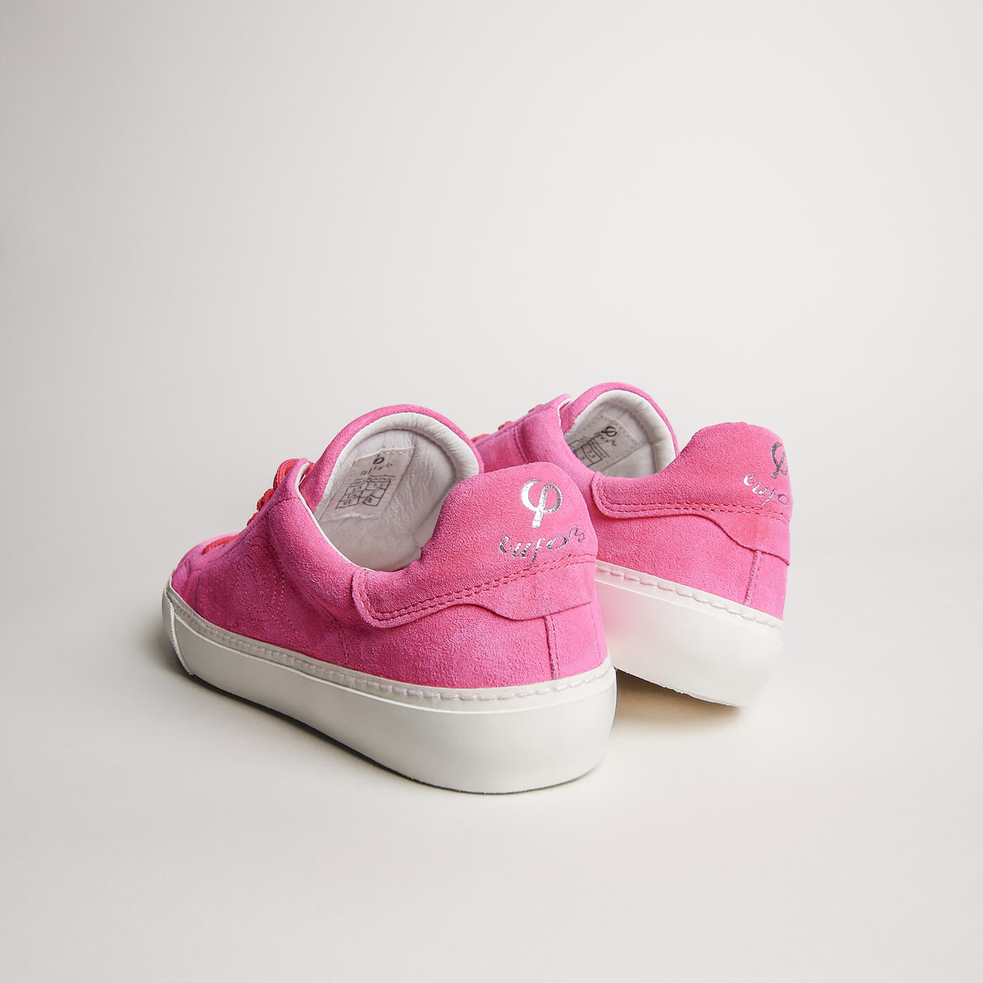 Rear view of women’s fuchsia suede Milano sneakers
