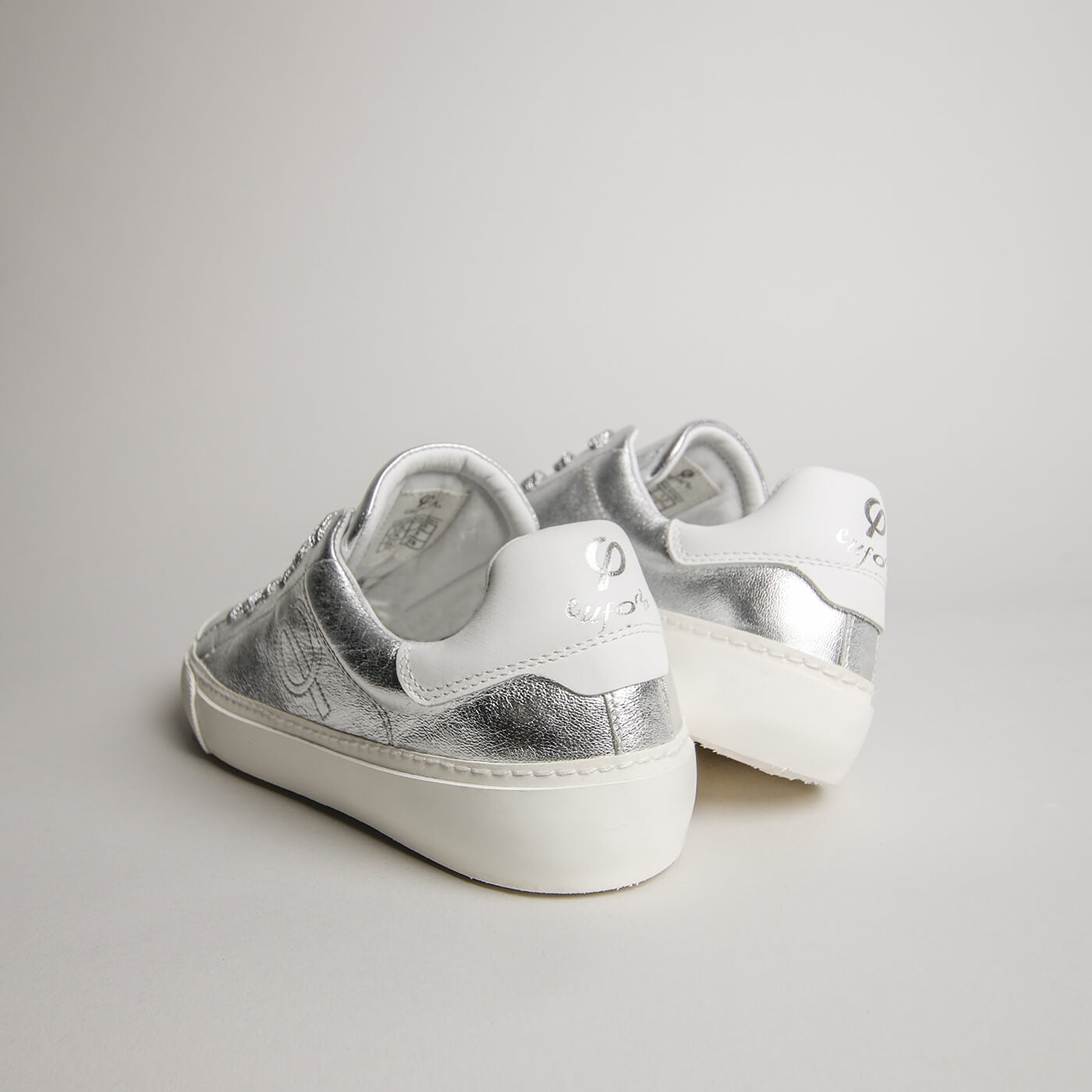 Rear view of women’s silver goat leather Milano sneakers