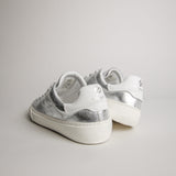 Rear view of women’s silver goat leather Milano sneakers