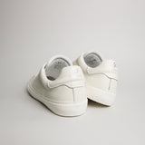 Rear view of men’s white tumbled leather Milano sneakers