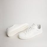 Pair of men’s white goat leather Milano sneakers with herringbone outsoles