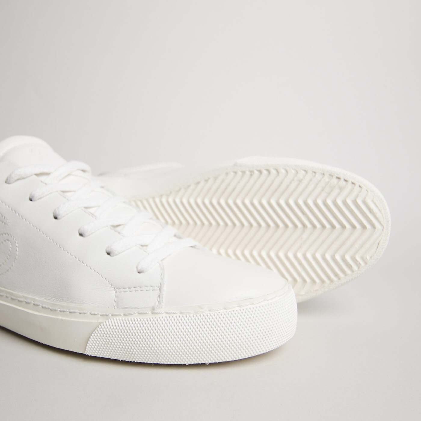Close-up of the toe, stitching and rubber outsole on the men’s White Goat Milano