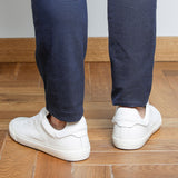Men wearing white goat leather Milano sneakers, rear view